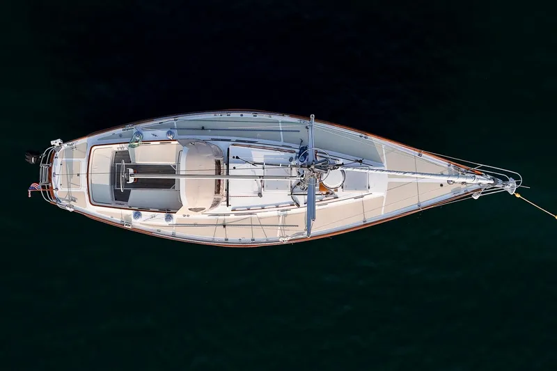 Slide: The Image of Aerial view of 1988 Hinckley Sou'wester 42 sailboat on dark water. - 10