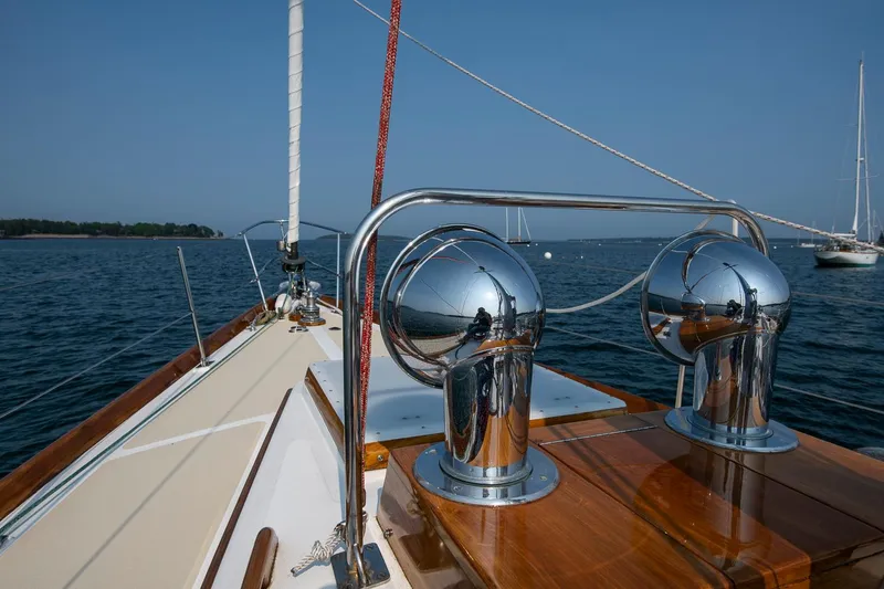 Slide: The Image of Hinckley Sou'wester 42 sailboat deck, 1988 model, with polished chrome fittings and ocean view. - 21