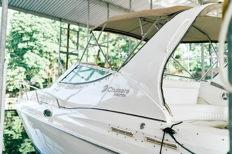 Slide: The Image of Helm of 2001 Cruisers Yachts 3075 Express with Lowrance navigation system and gauges. - 6