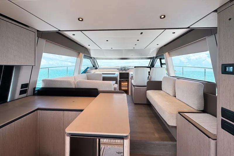 Slide: The Image of Luxurious interior of 2024 Ferretti Yachts 580 with modern furnishings and ocean view. - 20