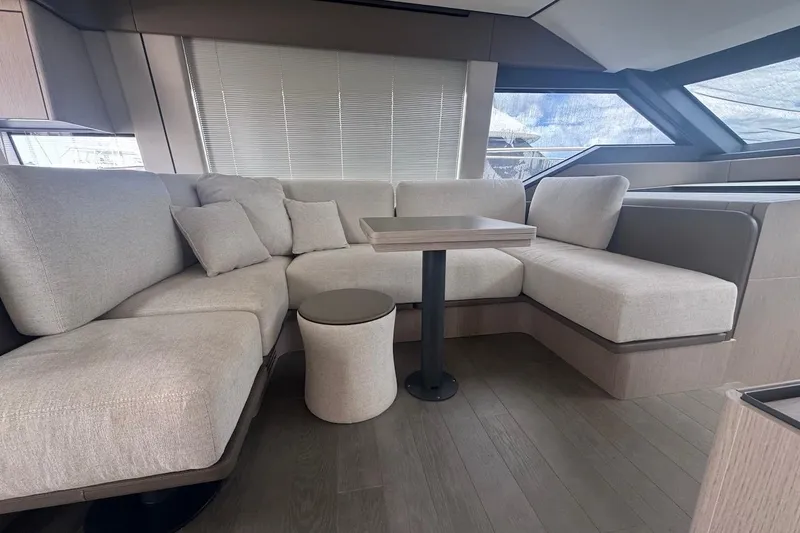 Slide: The Image of Luxurious interior of 2024 Ferretti Yachts 580 with elegant seating and modern design. - 28