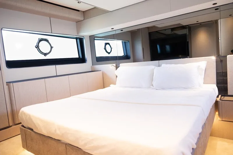 Slide: The Image of Luxurious bedroom interior of 2024 Ferretti Yachts 580 with modern design and large windows. - 33