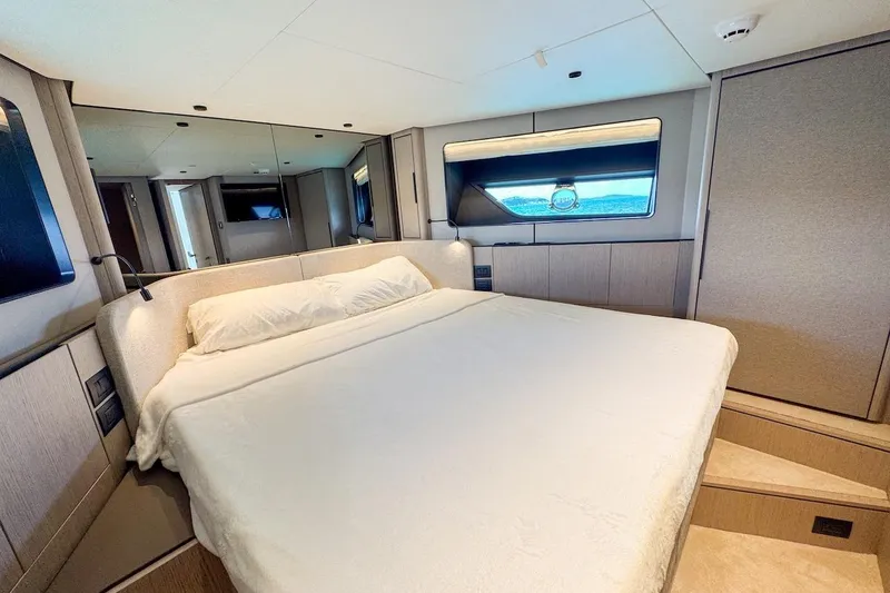 Slide: The Image of Luxurious bedroom interior of 2024 Ferretti Yachts 580 with modern design and large bed. - 39