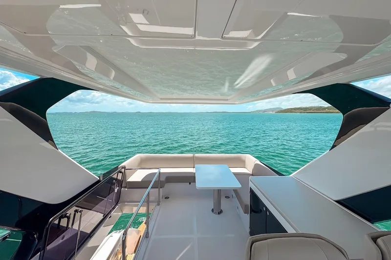 Slide: The Image of Luxurious 2024 Ferretti Yachts 580 interior with ocean view and sleek design. - 50