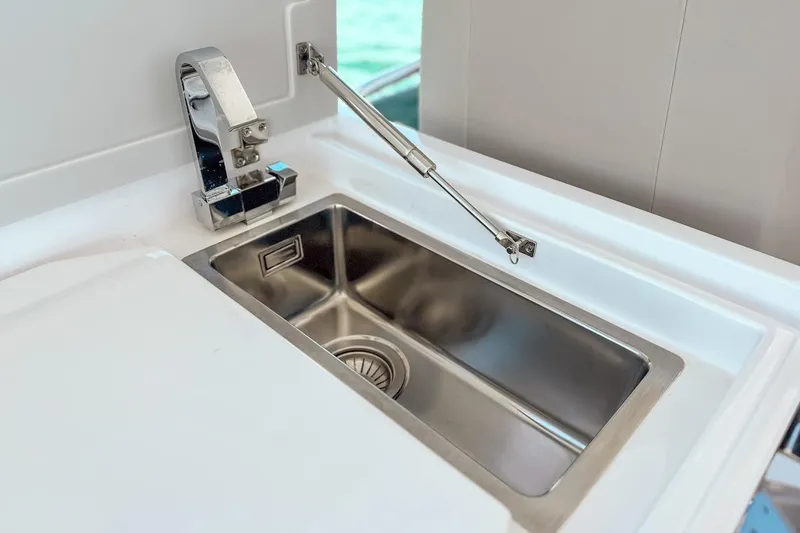 Slide: The Image of Stainless steel sink on 2024 Ferretti Yachts 580, featuring modern faucet design. - 52