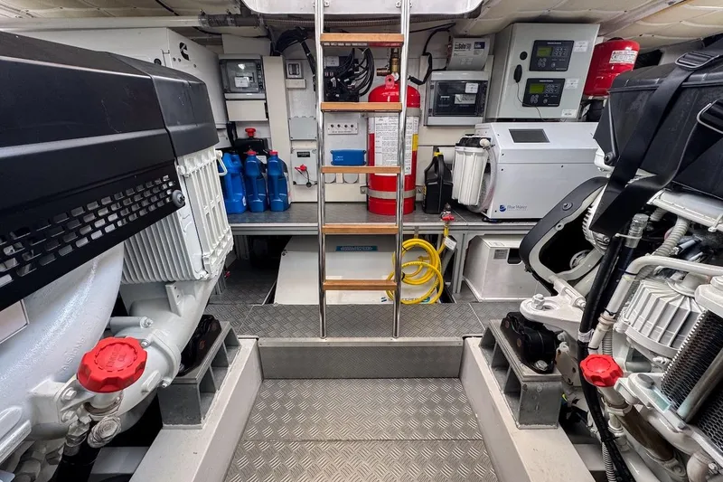 Slide: The Image of Engine room of 2024 Ferretti Yachts 580, featuring machinery and safety equipment. - 53