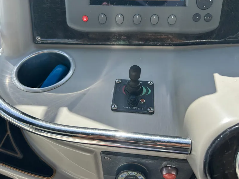 Slide: The Image of Control panel of a 2004 Formula 400 SS boat with joystick and buttons. - 20