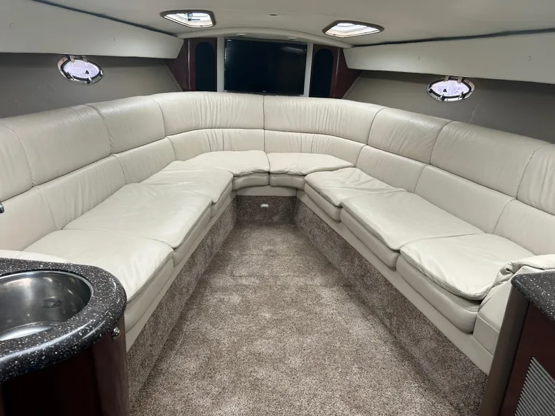 Slide: The Image of Luxurious interior of 2004 Formula 400 SS boat with plush seating and modern amenities. - 28