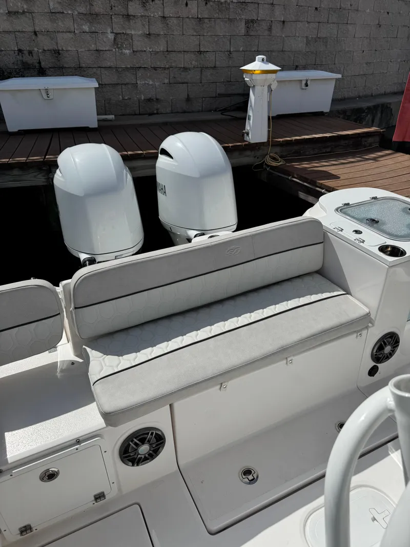 Slide: The Image of 2023 Sea Fox 268 Commander boat with twin Yamaha engines at dock. - 8