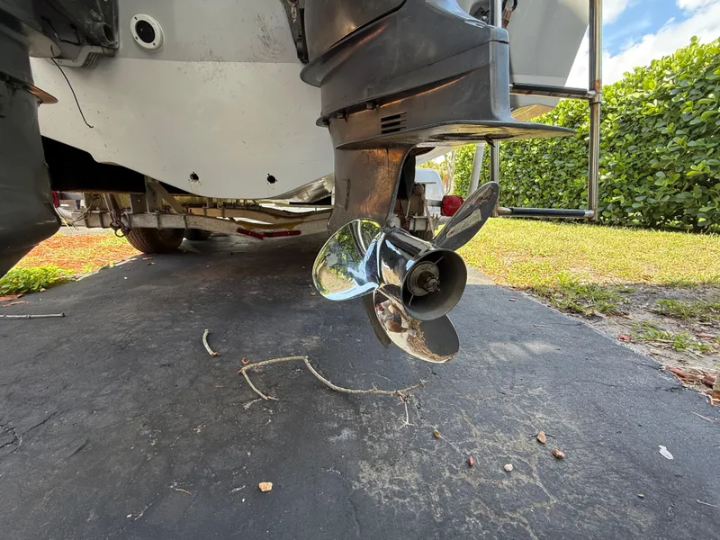 Slide: The Image of Propeller of a 2005 Boston Whaler 260 Outrage boat on a trailer. - 11