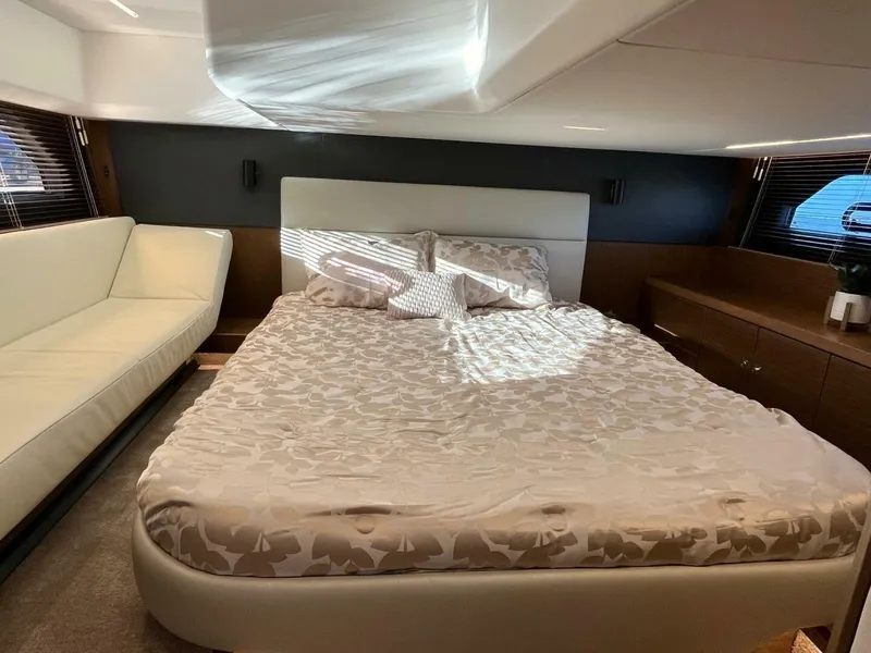 Slide: The Image of Luxurious bedroom interior of 2023 Bavaria R40 Coupe yacht with elegant bedding and modern design. - 10