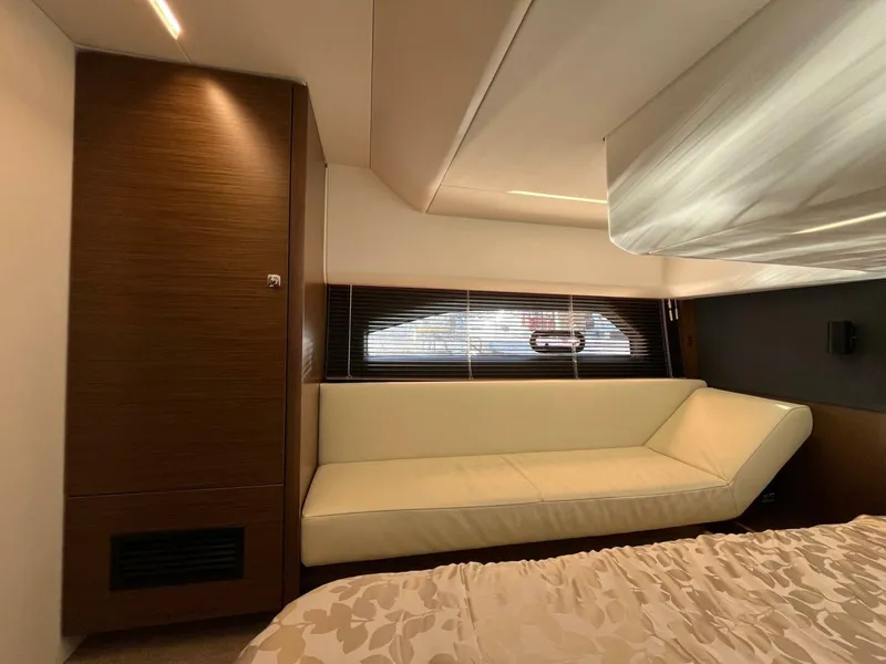 Slide: The Image of Luxurious interior of 2023 Bavaria R40 Coupe with beige sofa and modern design elements. - 9