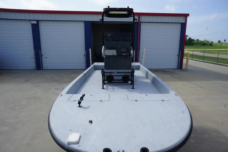 Slide: The Image of 2015 El Pescador 24 CAT boat in storage, front view. - 7