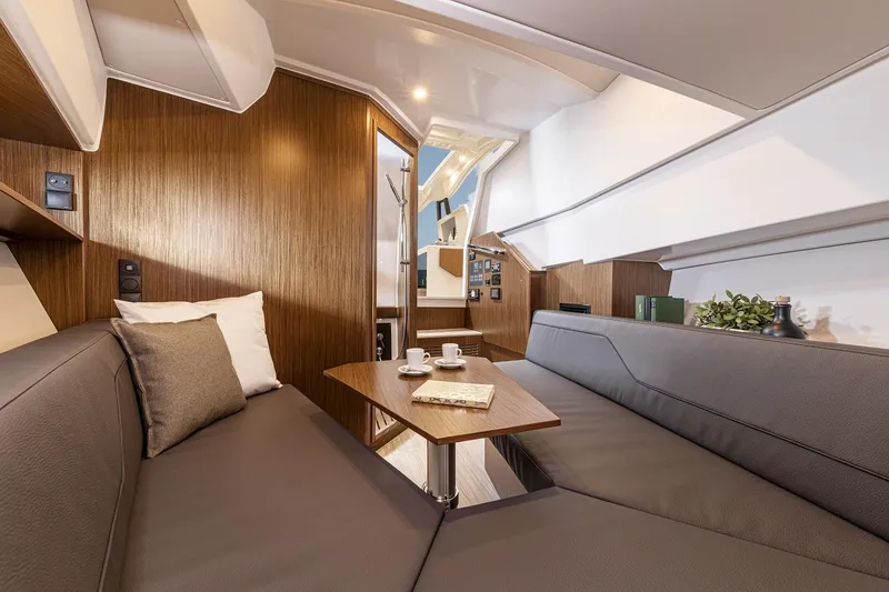 Slide: The Image of Luxurious interior of 2023 Bavaria Vida 33 yacht with modern seating and wooden accents. - 15