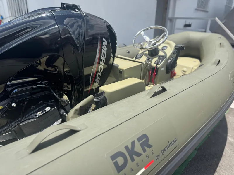 Slide: The Image of Inflatable boat with Mercury engine, Geniuss 380 HTS 2022 model, DKR Marine branding. - 8