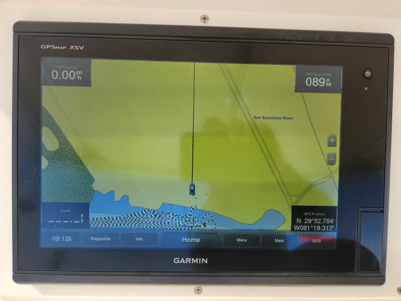 Slide: The Image of Garmin GPS display on 2008 Intrepid 323 Cuddy, showing San Sebastian River navigation. - 31