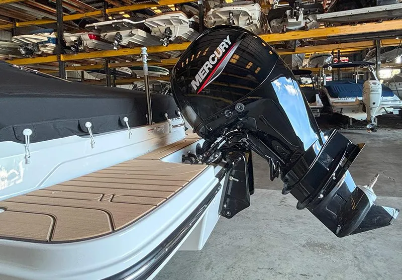 Slide: The Image of 2025 Sea Ray SPX 190 Outboard with Mercury engine in storage facility. - 14