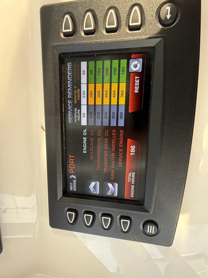 Slide: The Image of Display screen showing service reminders for a 2018 Intrepid 375 Open boat. - 11