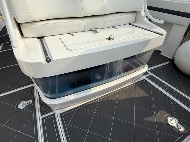Slide: The Image of 2018 Intrepid 375 Open boat seating with storage compartment on sleek deck. - 7
