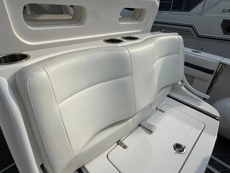 Slide: The Image of 2018 Intrepid 375 Open boat with white leather seating and cup holders. - 8