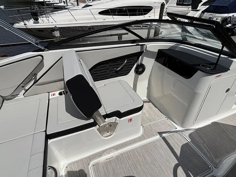 Slide: The Image of 2025 Sea Ray SPX 190 Outboard interior, featuring sleek seating and modern design elements. - 9