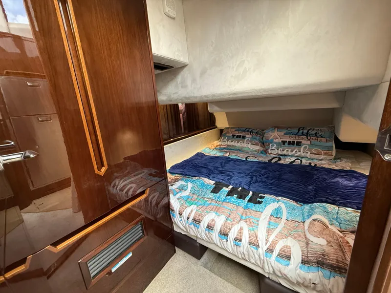 Slide: The Image of 2019 Galeon 430 HTC yacht interior with seating area overlooking serene water view. - 17
