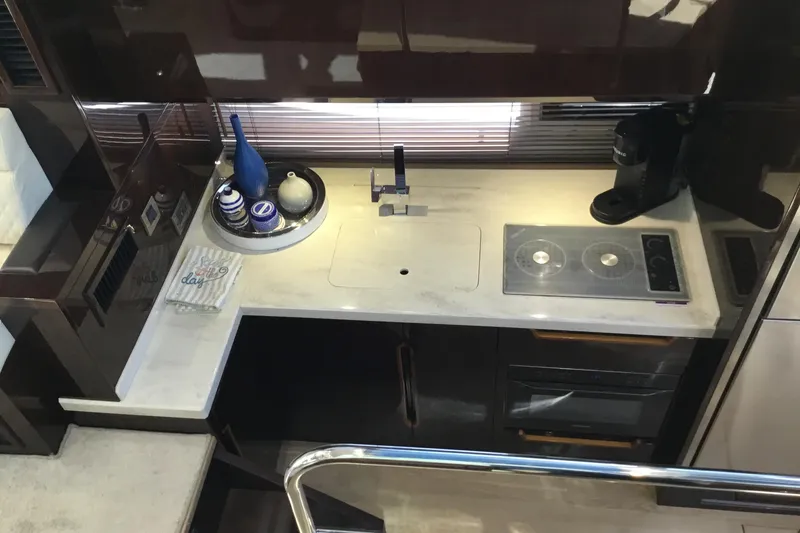 Slide: The Image of Control panel of 2019 Galeon 430 HTC yacht with Raymarine and Volvo Penta systems. - 38