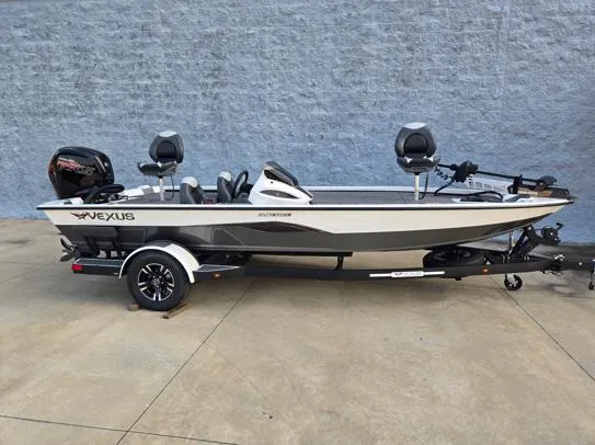 The Image of 2026 Vexus 1880C fishing boat with trailer, parked on concrete surface. - 1