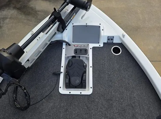 Slide: The Image of 2026 Vexus 1880C boat deck with trolling motor and control panel. - 2