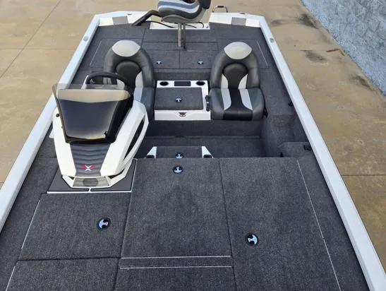 Slide: The Image of 2026 Vexus 1880C boat interior with dual seats and console, featuring a sleek design. - 3