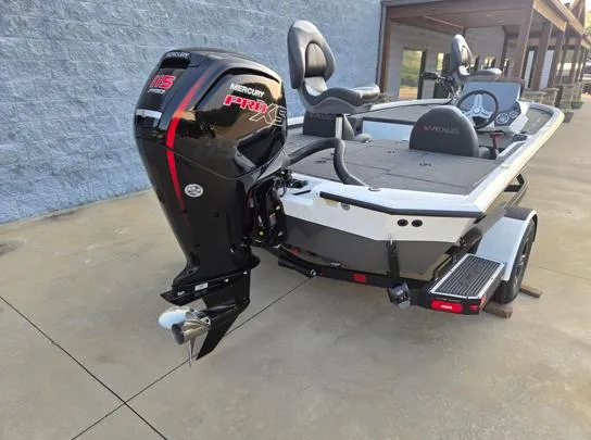 Slide: The Image of 2026 Vexus 1880C boat with Mercury Pro XS engine, parked on concrete. - 7