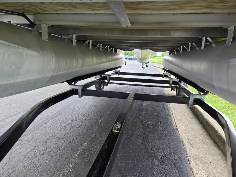 Slide: The Image of Underneath view of a 2007 Bennington 2075GL pontoon boat on a trailer. - 7