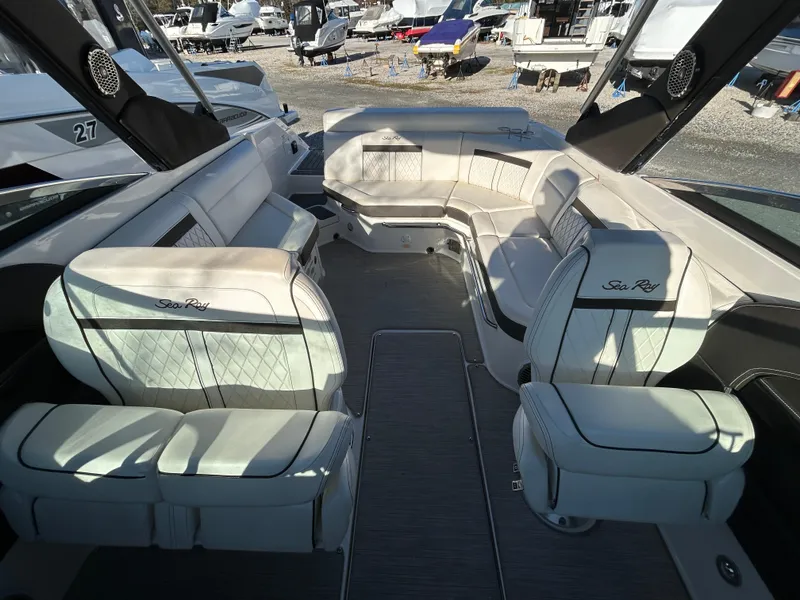 Slide: The Image of Luxurious interior of a 2018 Sea Ray SLX 280 boat with elegant seating. - 10