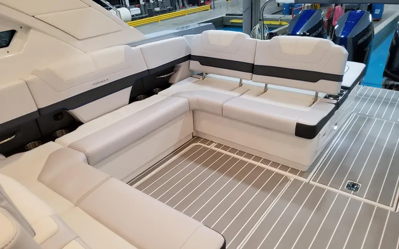 Slide: The Image of 2026 Formula 400 Super Sport Crossover boat interior with luxurious seating and modern design. - 12