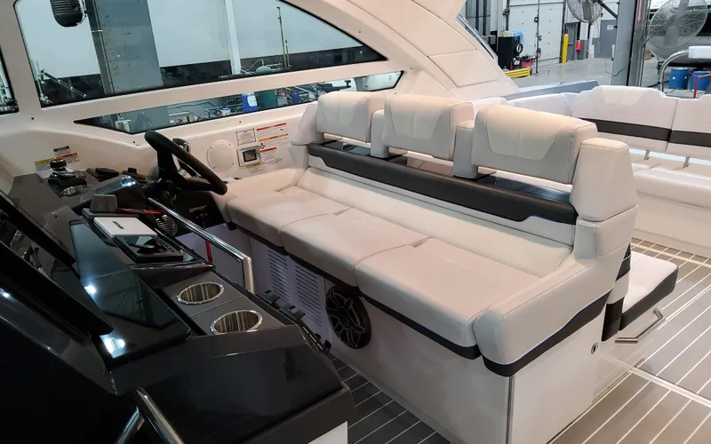 Slide: The Image of 2026 Formula 400 Super Sport Crossover interior with luxurious seating and modern helm controls. - 17