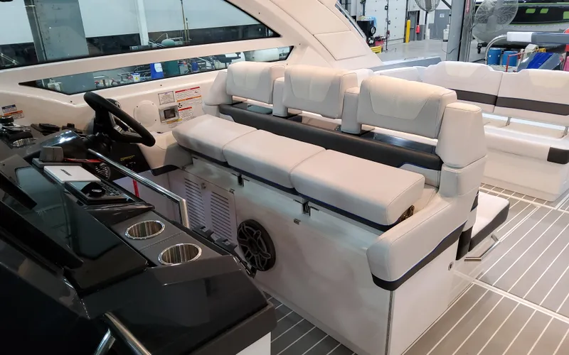 Slide: The Image of 2026 Formula 400 Super Sport Crossover interior with luxurious seating and modern helm design. - 18