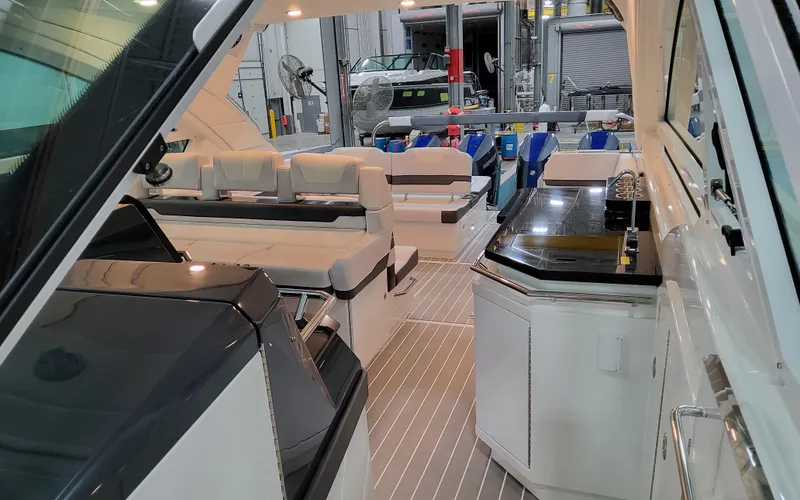 Slide: The Image of Interior of 2026 Formula 400 Super Sport Crossover yacht with luxurious seating and sleek design. - 21