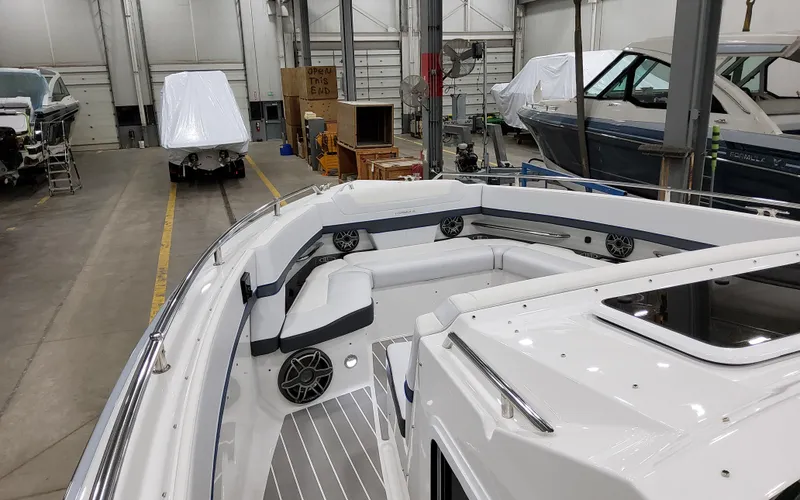 Slide: The Image of 2026 Formula 400 Super Sport Crossover boat interior in a showroom. - 25