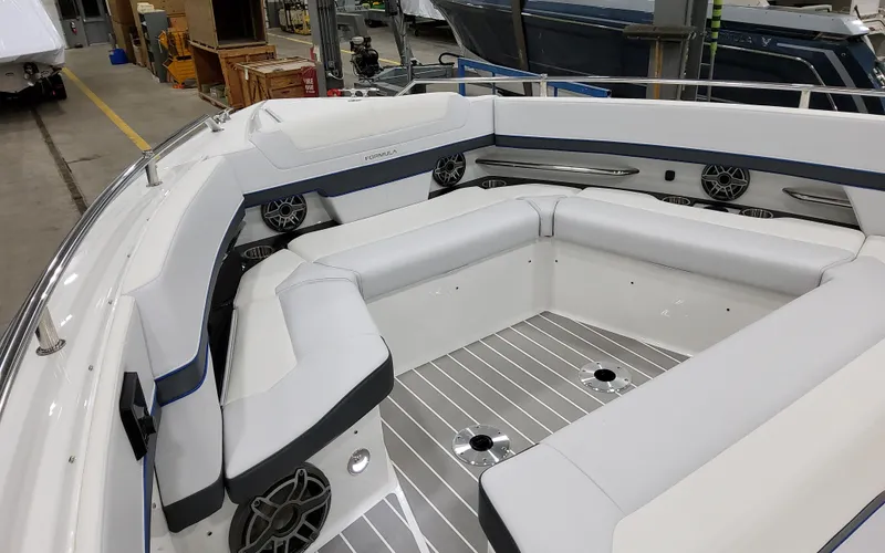 Slide: The Image of 2026 Formula 400 Super Sport Crossover boat interior with sleek seating and modern design. - 26