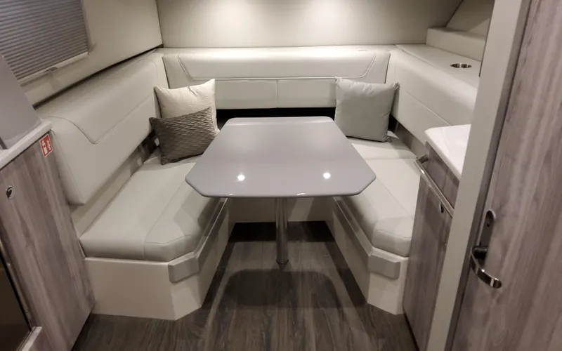 Slide: The Image of 2026 Formula 400 Super Sport Crossover interior with modern seating and sleek table design. - 30