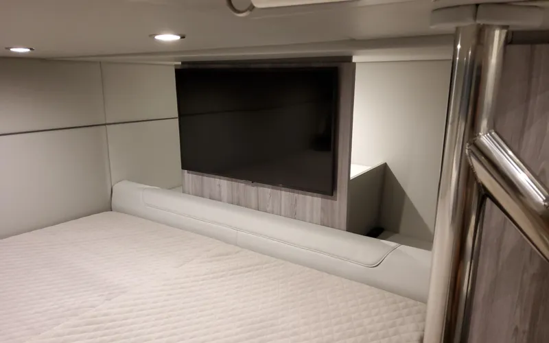 Slide: The Image of Interior of 2026 Formula 400 Super Sport Crossover with TV and bed. - 36
