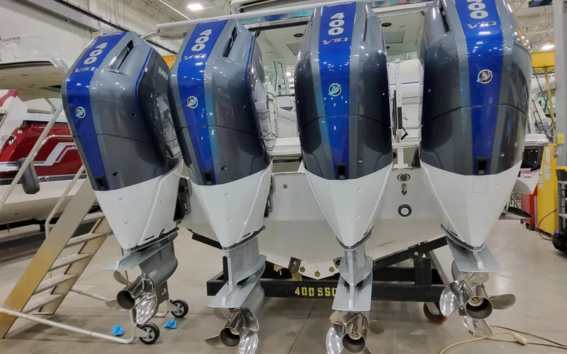 Slide: The Image of Four powerful outboard motors on a 2026 Formula 400 Super Sport Crossover boat. - 4