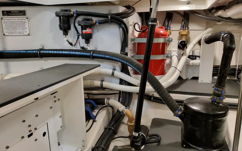 Slide: The Image of Engine room of 2026 Formula 400 Super Sport Crossover with hoses and equipment. - 40