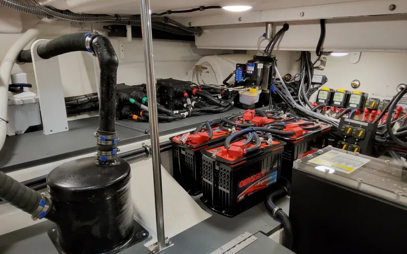 Slide: The Image of Engine room of 2026 Formula 400 Super Sport Crossover with batteries and wiring. - 41