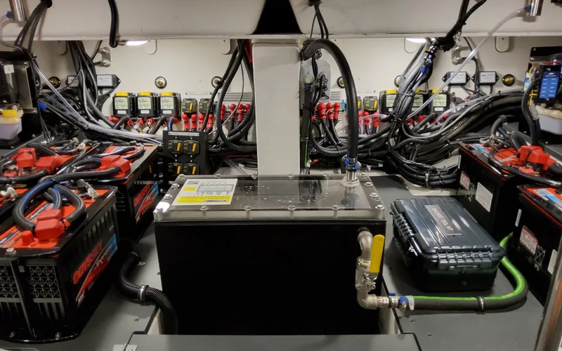 Slide: The Image of Engine room of 2026 Formula 400 Super Sport Crossover with batteries and wiring. - 42