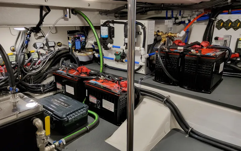 Slide: The Image of Engine room of 2026 Formula 400 Super Sport Crossover with batteries and wiring. - 43