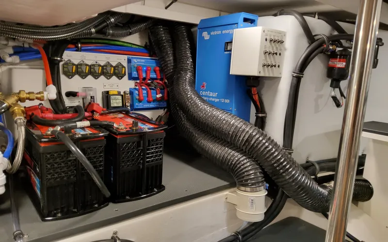 Slide: The Image of Electrical system of 2026 Formula 400 Super Sport Crossover with batteries and charger. - 44