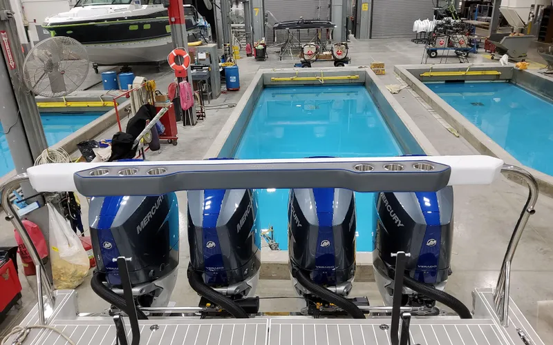 Slide: The Image of 2026 Formula 400 Super Sport Crossover with Mercury engines in a testing facility. - 8