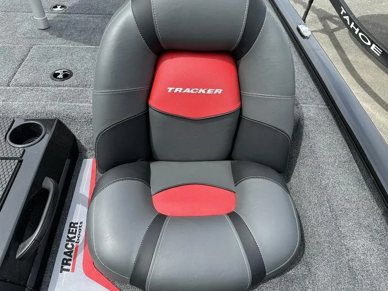 Slide: The Image of 2025 Tracker SAVAGE™ 215 boat interior with Garmin navigation system and storage compartments. - 6