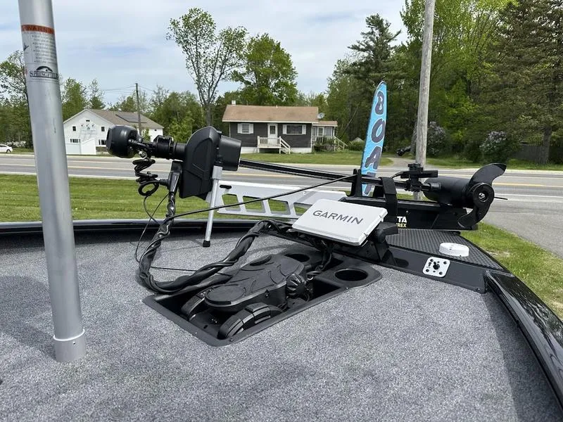 Slide: The Image of Steering wheel and Garmin display on 2025 Tracker SAVAGE™ 215 boat. - 9